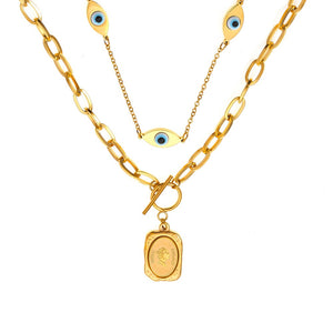Gold-tone eye and coin necklace in a main product view