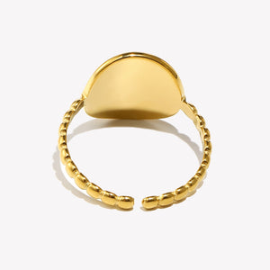 Gold-tone eight-point signet ring in a closer product view