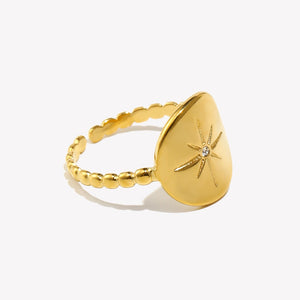 Gold-tone eight-point signet ring shown in a product view