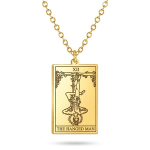 Gold The Hanged Man tarot-card pendant necklace on a white background.