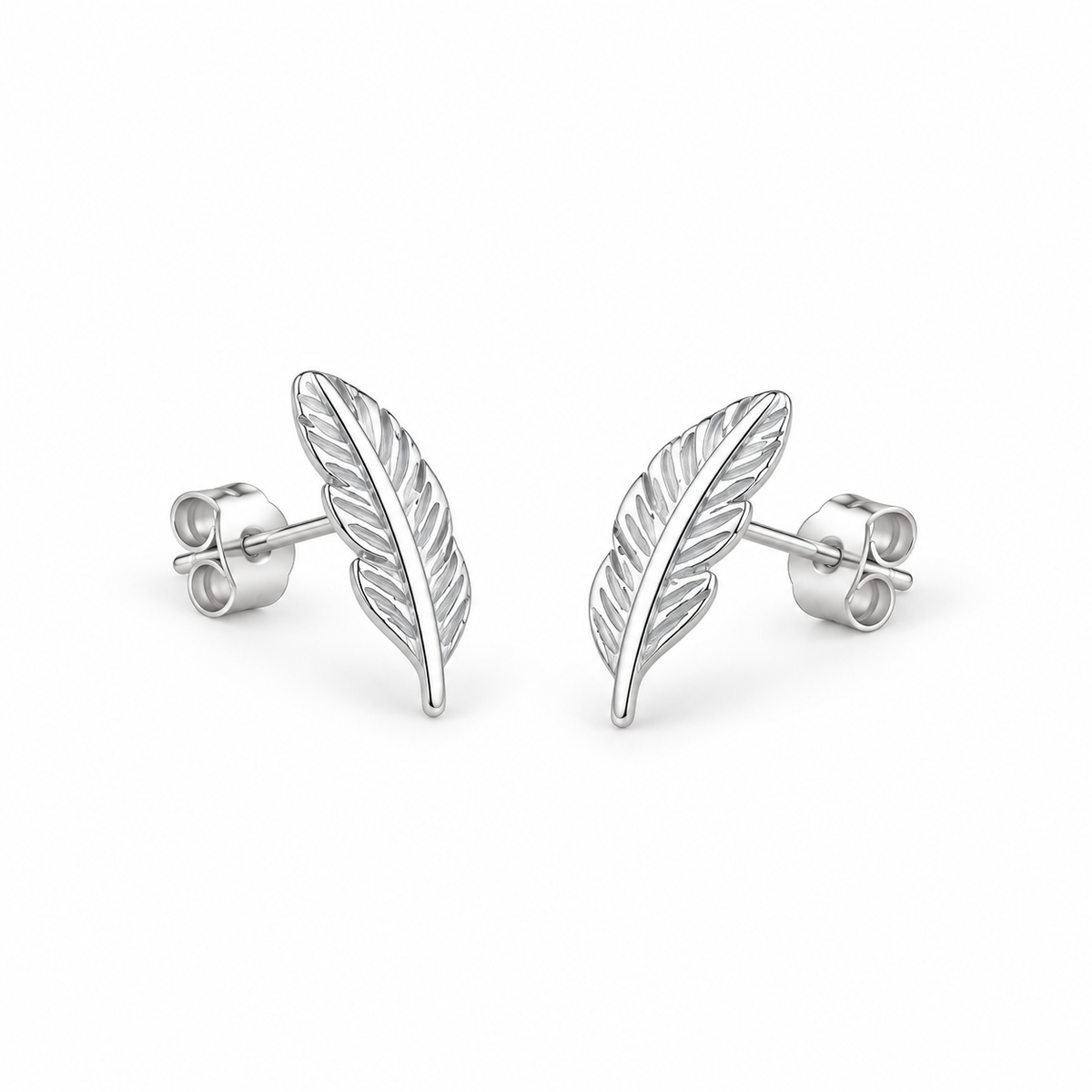Silver-tone feather stud earrings on a warm-white background