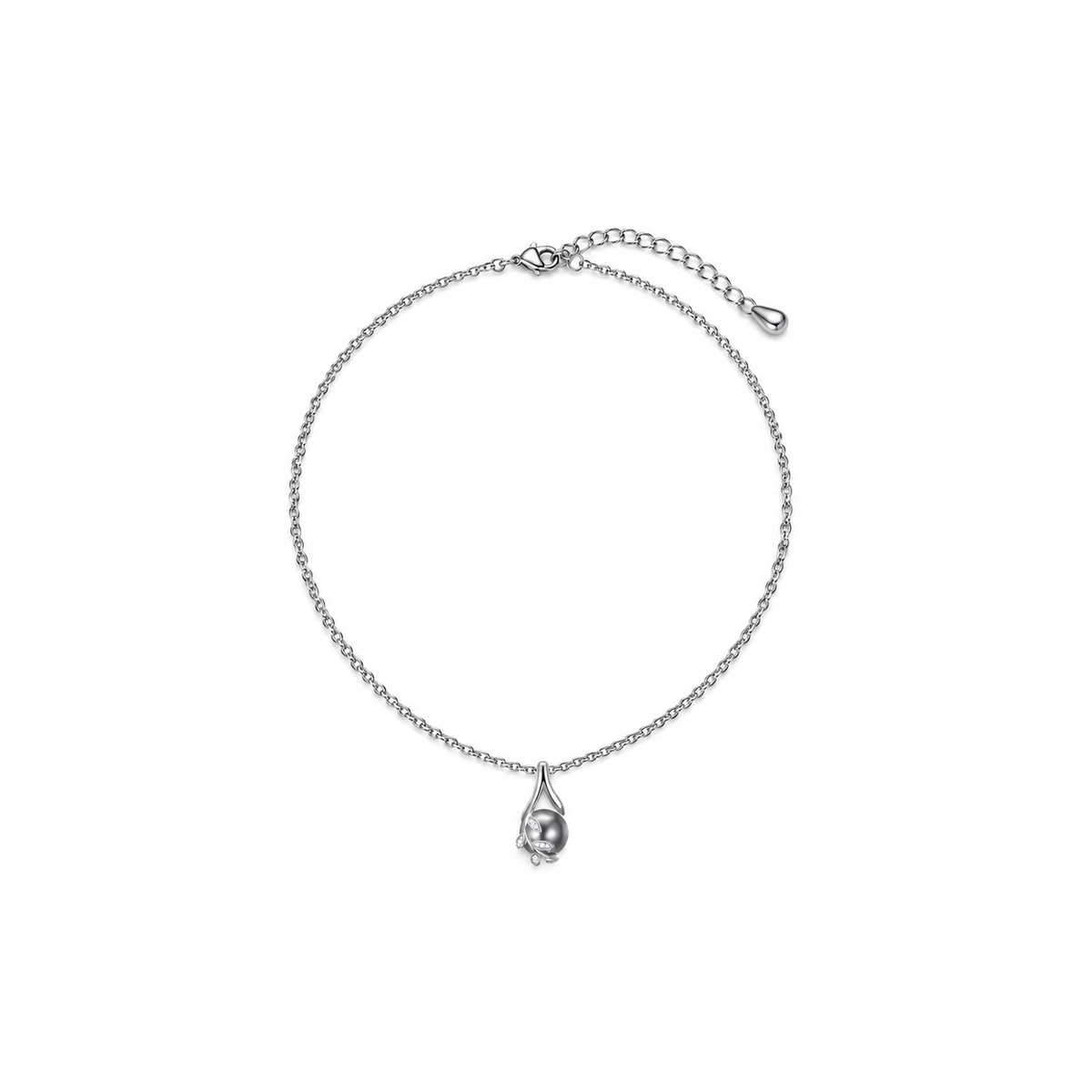 Silver-tone grey orb necklace on a warm-white background