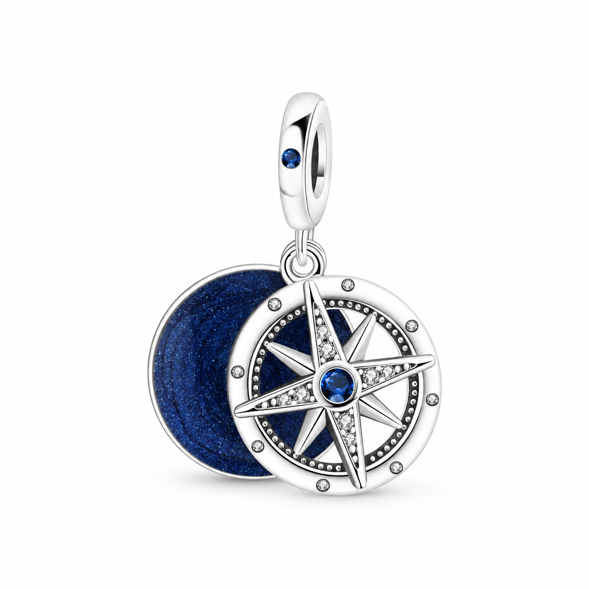 Silver-tone compass charm pendant on a plain warm-white background