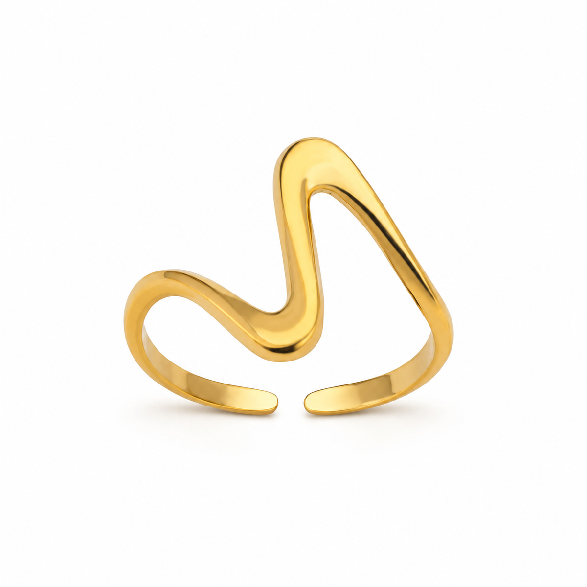 Gold-tone wave ring on a warm-white background