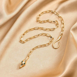 Gold-tone snake-head chain necklace in a detail product view