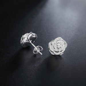 Silver-tone rose stud earrings in a closer product view