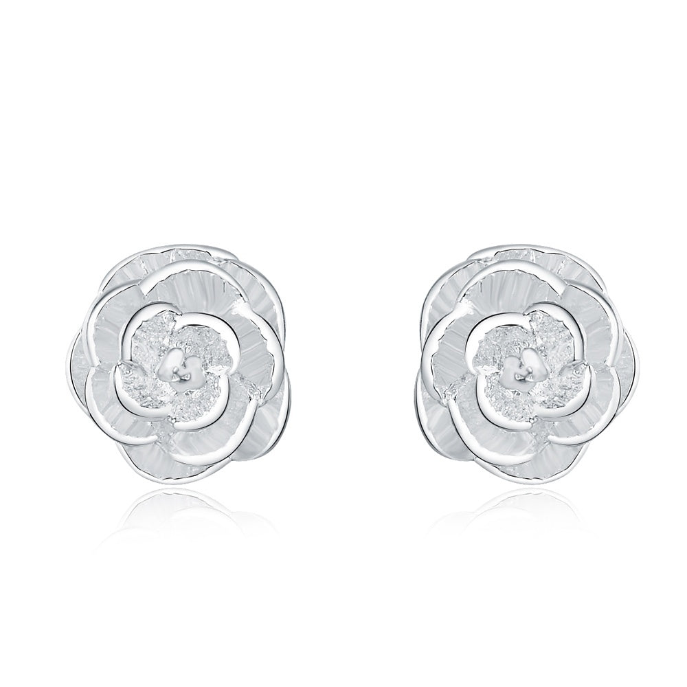 Silver-tone rose stud earrings shown in a product view