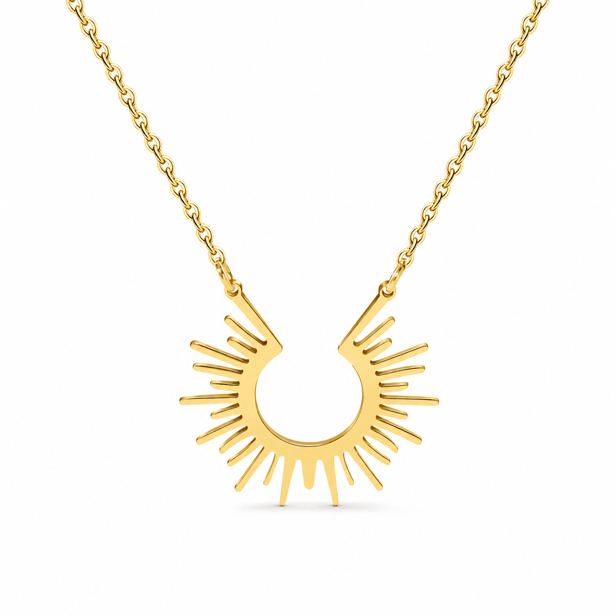 Gold-tone open-center sun pendant necklace with slender rays